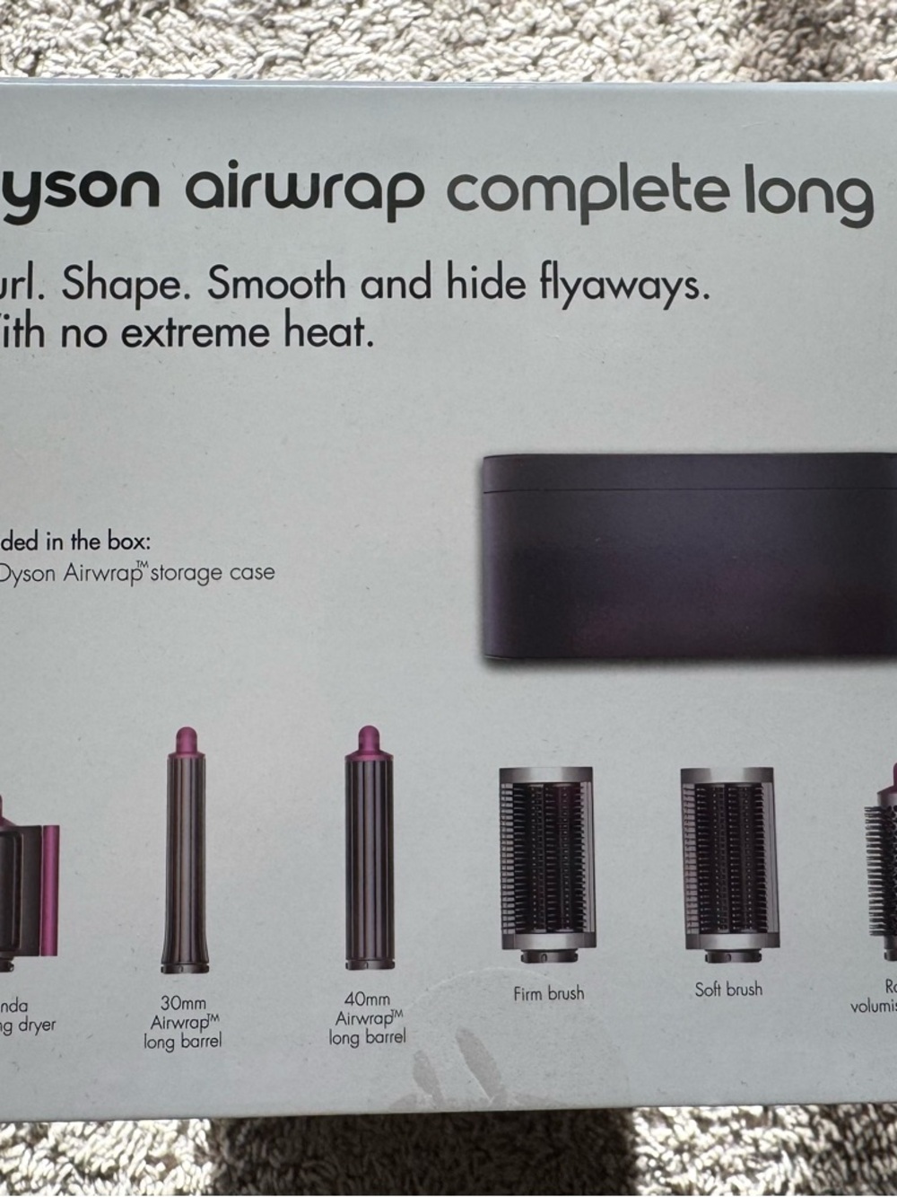 Dyson hair styler in Gray and Pink accents